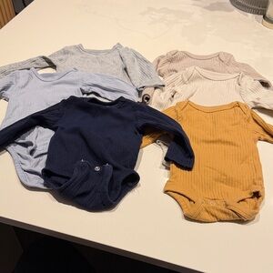 6 Long sleeve onesies 3 newborn cloud island and 3 H&M 0-3m